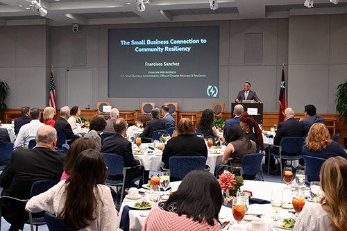 Event attendees listen to Fransico Sanchez, associate administrator of SBA Office of Disaster Recovery and Resilience