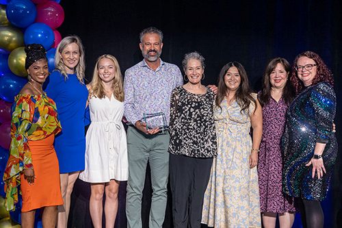 Texas Mutual employees with award