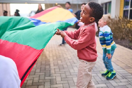 Children playing at Foundation Communities
